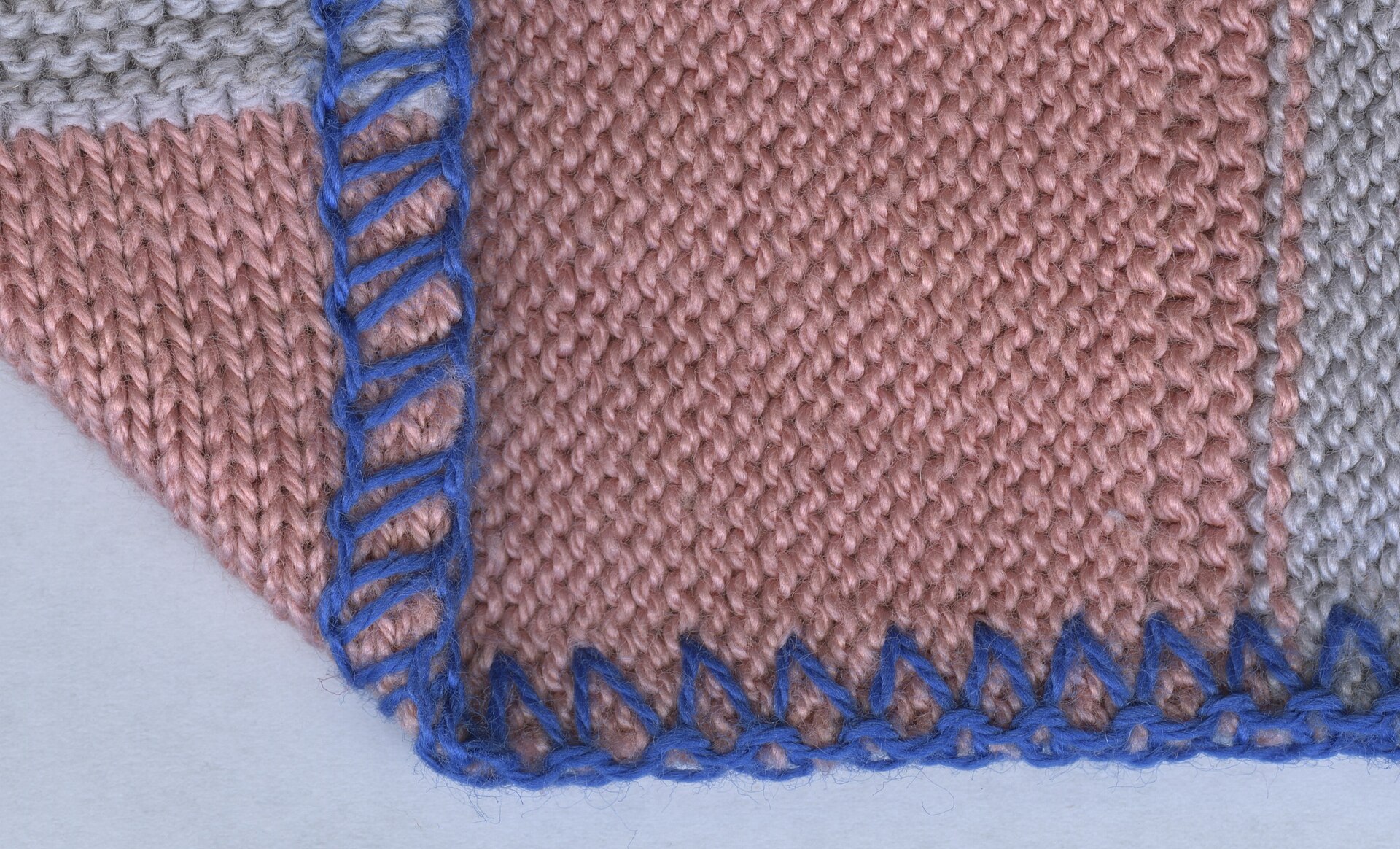 Stretchy knit fabric being finished on an overlock machine