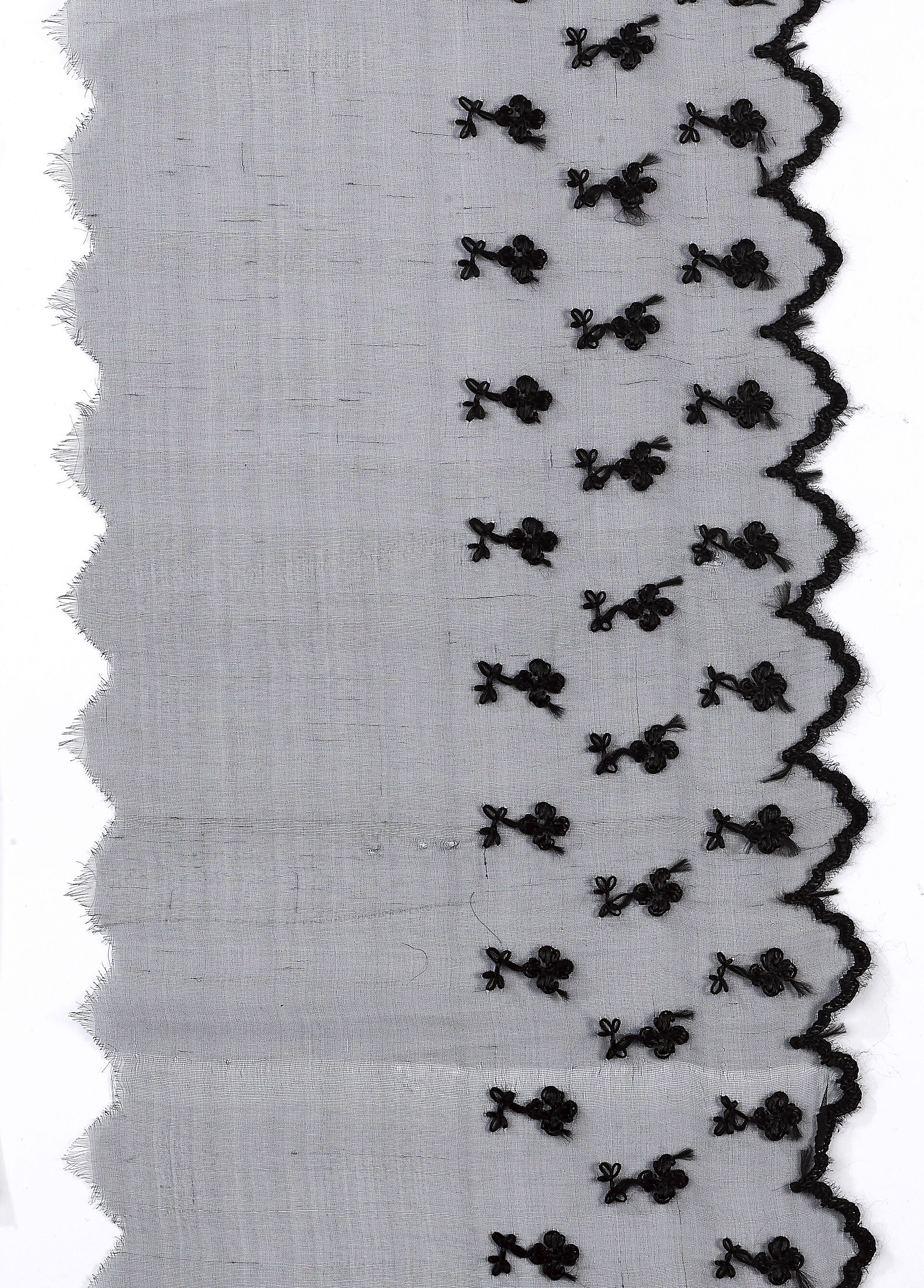 A close view of dense machine-embroidery stitches