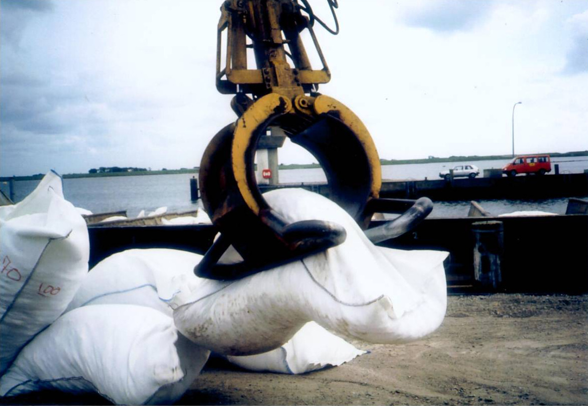 A sheet of stabilizer backing beside fabric
