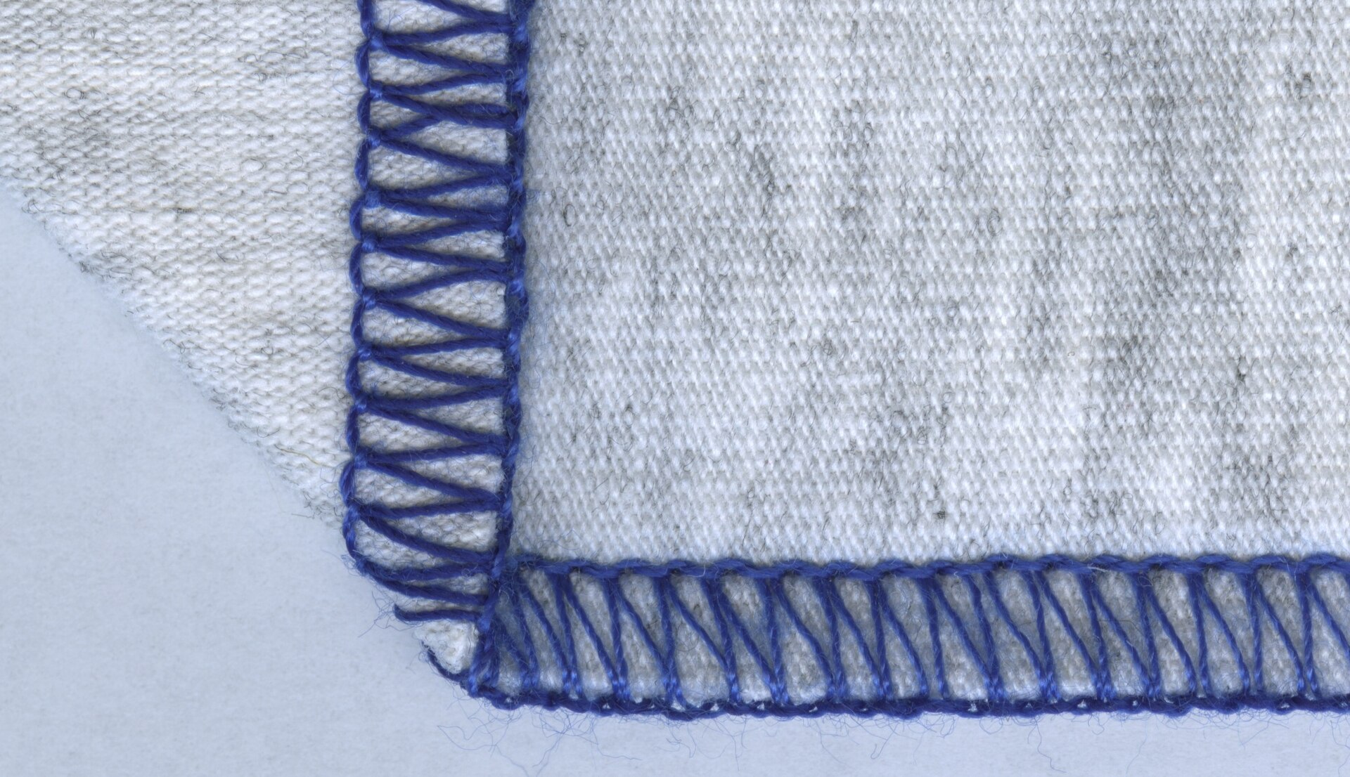 The colored tension dials on an overlocker