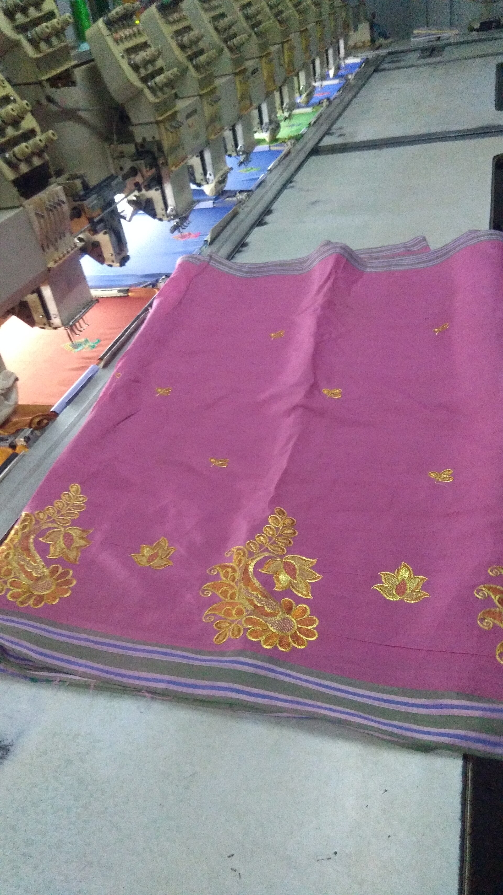 A finished machine-embroidered design stitched into fabric