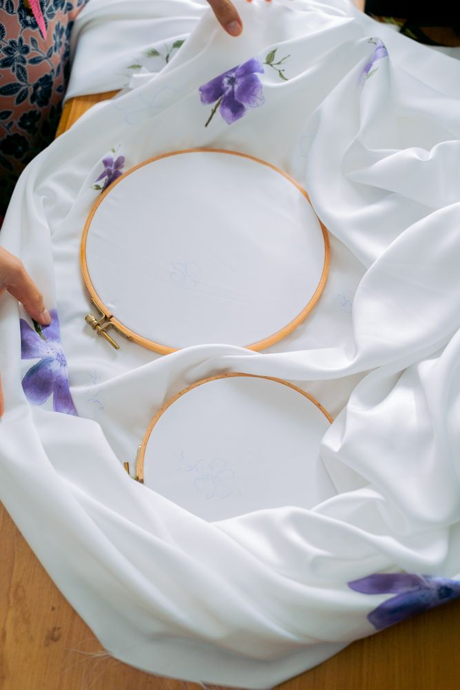 A large machine embroidery hoop showing the 5x7 inch frame used on the PE900