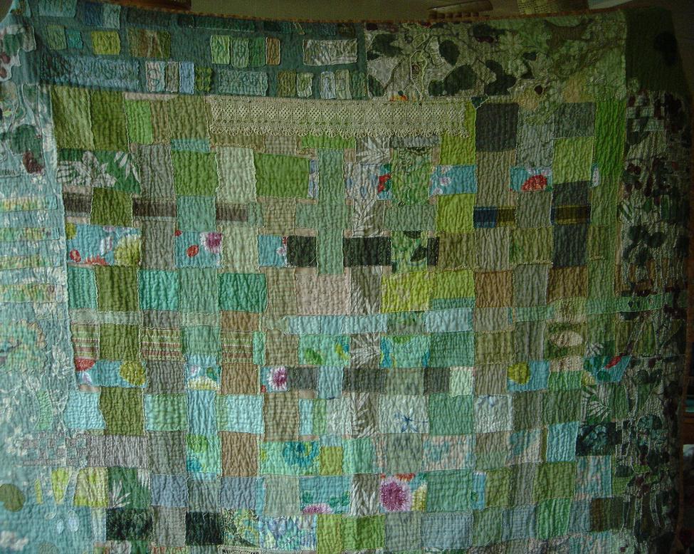 Hand-dyed linen patchwork quilt top in a woven strip pattern